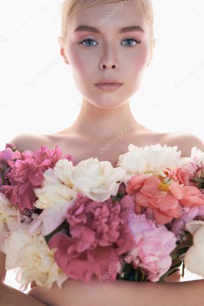 Young beautiful woman with bouquet of roses. Professional art ma