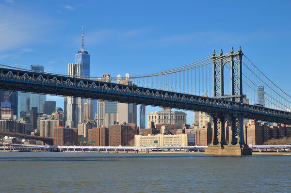 View of the Manhattan Bridge at sunny day.