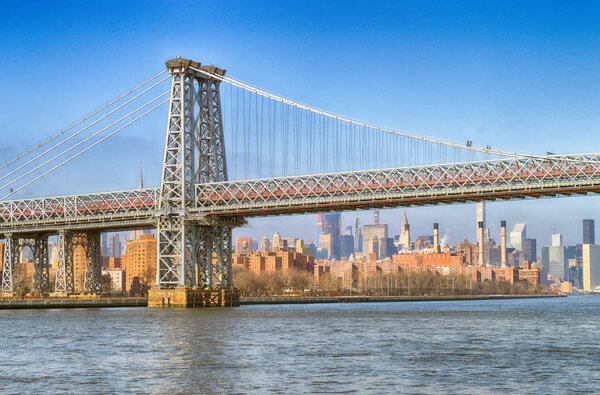 View of the Williamsburg Bridge at sunny day.