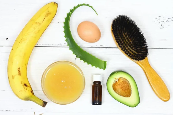 stock image Ingredients for hair mask on the white board, top view  