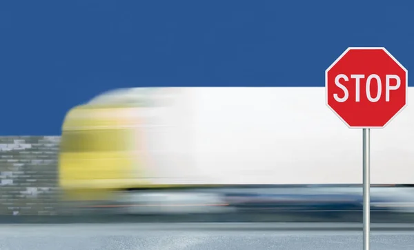 Red Stop Road Sign Motion Blurred Truck Vehicle Traffic Background — Stock Photo, Image