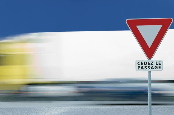 Give Way Yield French Cedez Passage Road Sign Motion Blurred — Stock Photo, Image