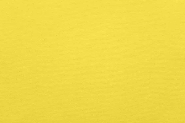 Texture of illuminating yellow colored paper for watercolor and pastel. Fashionable pantone color of spring-summer 2021 season from fashion week. Modern luxury background or mock up, copy space — Stock Photo, Image