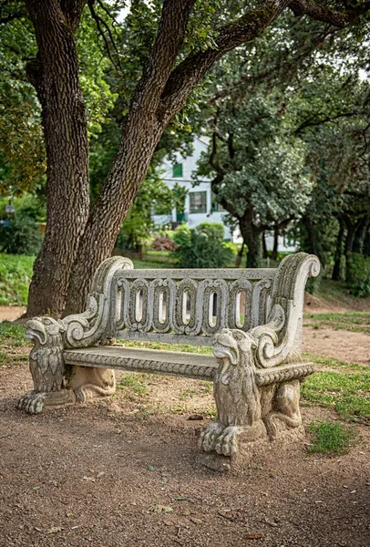 Stone bench on the Fonyod promenade at the lake Balaton, Hungary