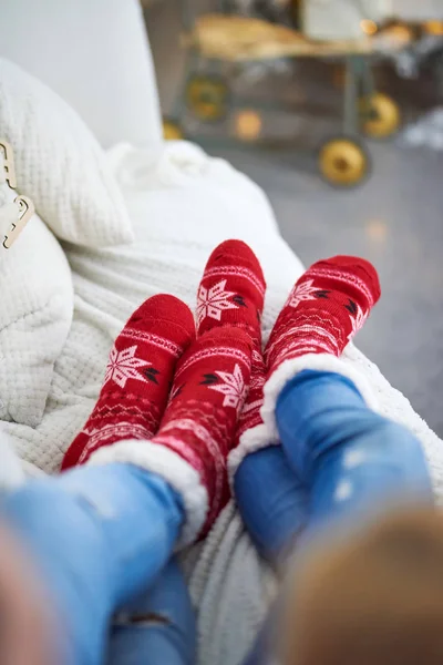 Couple in christmas socks — Stock Photo, Image