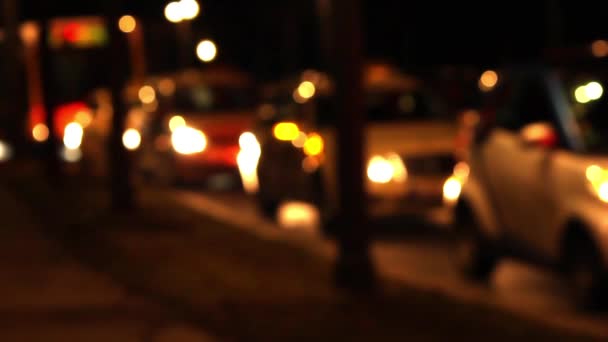 Blurry Traffic Lights Cars Pass — Stock Video