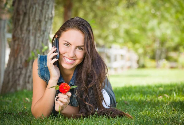 Attractive Happy Mixed Race Young Female Talking Cell Phone Laying — Stock Photo, Image