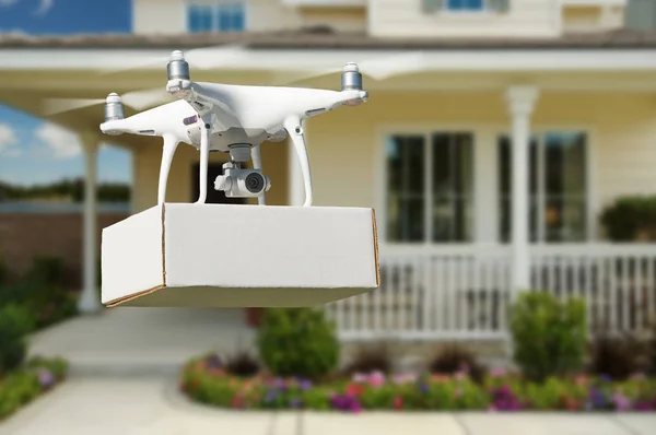 Unmanned Aircraft System Uav Quadcopter Drone Delivering Package House — Stock Photo, Image