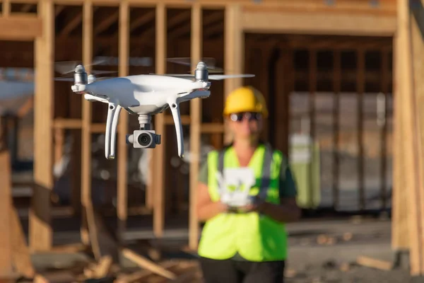 Female Pilot Flies Drone Quadcopter Inspecting Construction Site — Stock Photo, Image