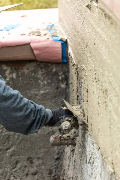 Tile Worker Applying Cement with Trowel at Pool Construction Sit — Stock Photo, Image