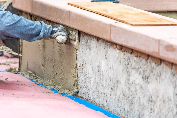 Tile Worker Applying Cement with Trowel at Pool Construction Sit — Stock Photo, Image