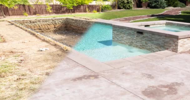 Looping Seamless Cinemagraph Swimming Pool Construction Fading Completed Pool — Stock Video