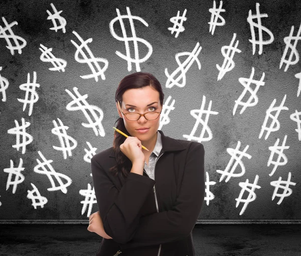 Dollar Signs Drawn on Wall Behind Young Adult Woman with Pencil — Stock Photo, Image