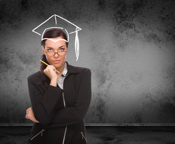Graduation Cap Drawn on Head of Young Adult Woman with Pencil In Front of Wall with Copy Space — Stock Photo, Image