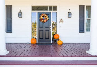 Fall Decoration Adorns Beautiful Entry Way To Home clipart