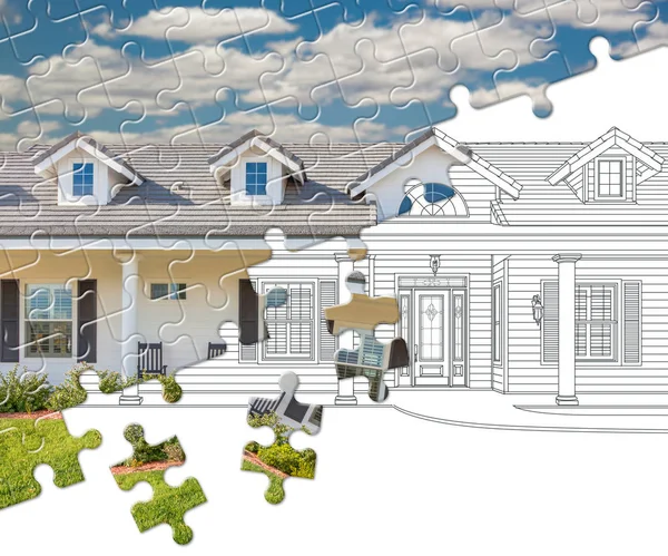 一緒にフィッティングパズルピースは、図面上の完成した家のビルドを明らかに — ストック写真