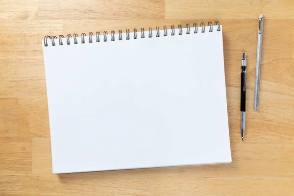 Blank Sketch Paper Tablet Binder Resting on Desk Top with Engineering Pencil and Ruler. — Stockfoto