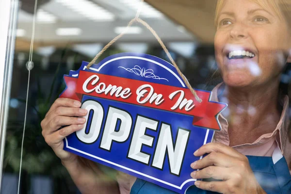 Happy Female Store Owner Turning Open Sign Window — Stock Photo, Image