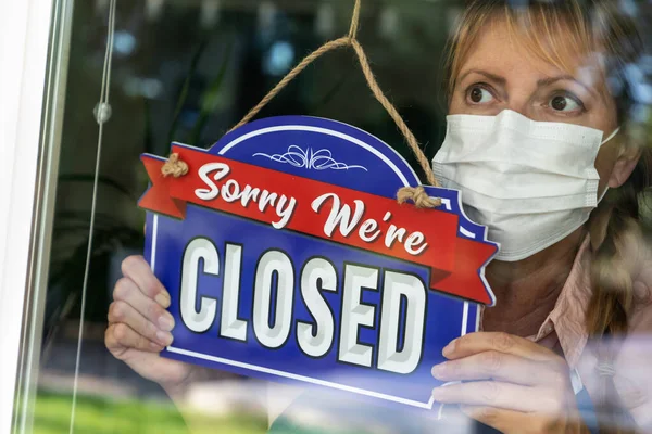 Female Store Owner Wearing Medical Face Mask Turning Sign Closed — Stock Photo, Image