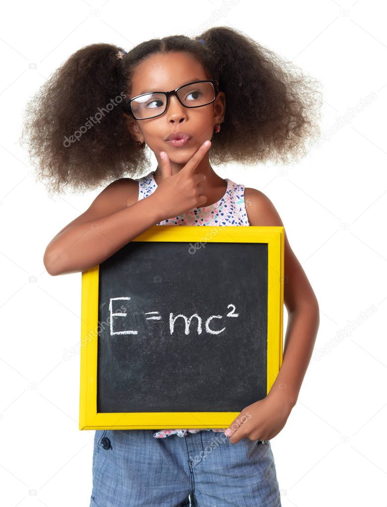 Cute african american girl with glasses holding a sign with a famous physics formula - Isolated on white