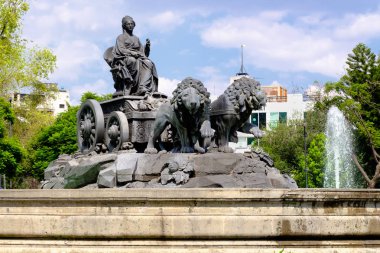 The fountain of Cibeles in Madrid Square, at colonia Roma in Mexico City clipart