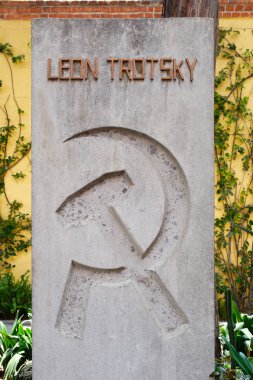 The grave of the exiled soviet leader Leon Trotsky at the house where he lived in Coyoacan, Mexico City clipart