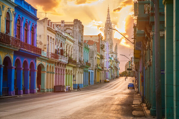 Street scene with sunset in downtown Havana