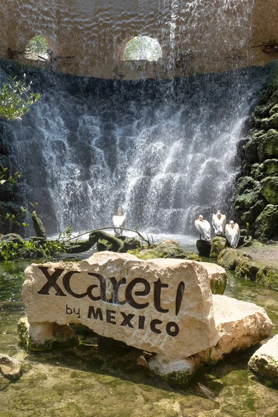 Sign and waterfalls on the XCaret park on the Mayan Riviera in Mexico — Stock Photo, Image