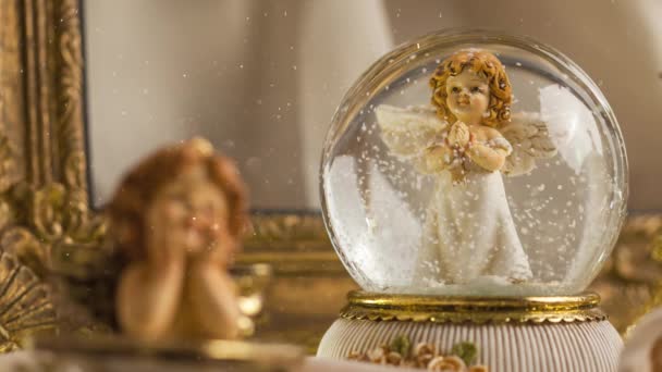 Christmas Decoration Snow Globe Angels Advent Season Floating Glitter Effect — Stock Video