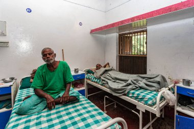 Sundarpur, India - 2013: Unidentified Indian leprosy patient in a local leprosy hospital in Sundarpur, Bihar state, India clipart