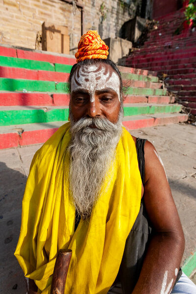 India, Varanasi - April 23, 2011: Unidentified Sadhu man with painted forehead 