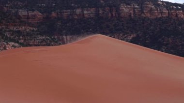 Sun has barely set above Coral Pink Sand Dunes State Park near Kanab, Utah, USA