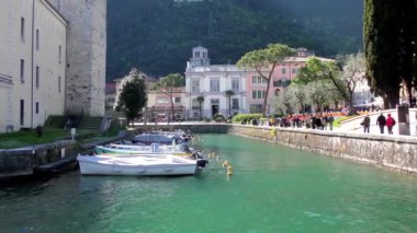 RIVA DEL GARDA, ITALY - APRIL 19, 2015: 4K footage of the historic city centre on April 19, 2015, in Riva del Garda, Italy. Riva del Garda is a popular holiday location in northern Italy.