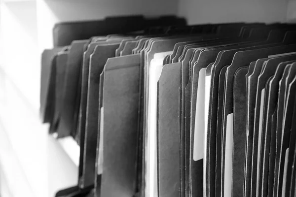 File folders on shelf for office organization