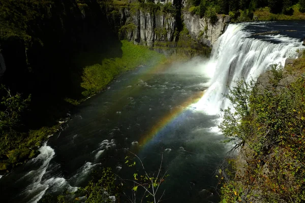 Mesa Falls Waterfall Water Fall Ruged Canyon with Mist and Rainb