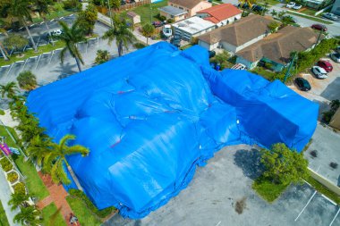 Aerial image of a building tented in blue clipart
