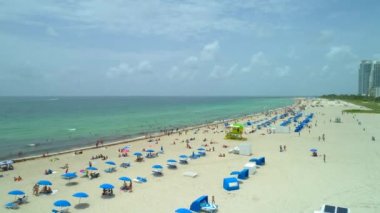 Epik uçağı Miami Beach insanlar sahilde vurdu