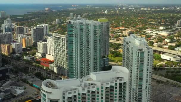 Aerial Reveal Highrise Buildings Pool Deck — Stock Video