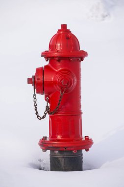 Red fire hydrant in white snow clipart