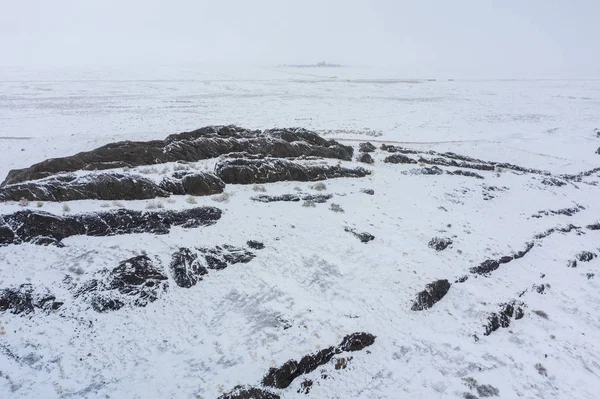 Winter landscape rocks and snow