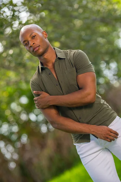 Portrait of a young African American man in a tough guy pose wit — Stock Photo, Image