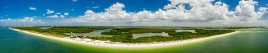 Lovers Key Naples Florida beach tropical scene clipart