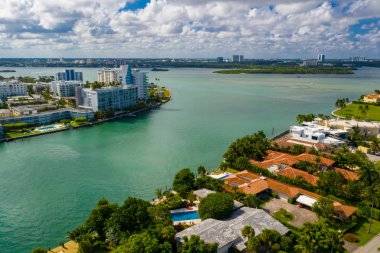 Luxury homes and condominiums on the water Miami Beach FL clipart