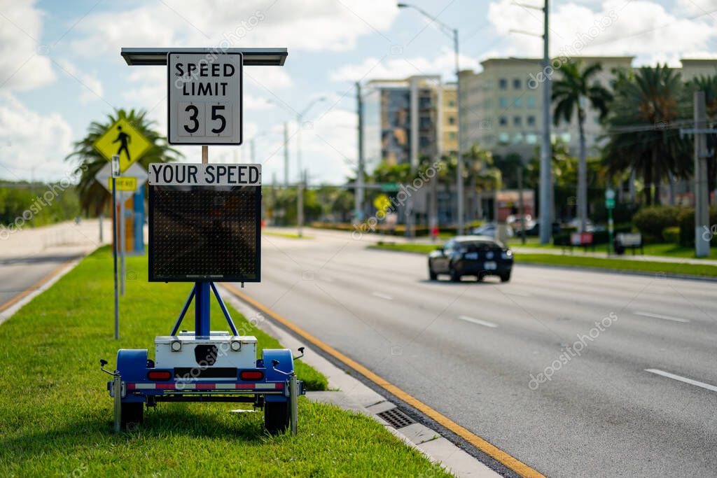 Speed limit radar in the city showing drivers their speed as approaching