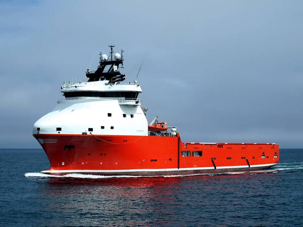Offshore supply vessel underway to offshore installation.