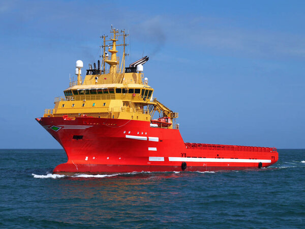 Offshore supply vessel underway to offshore installation.