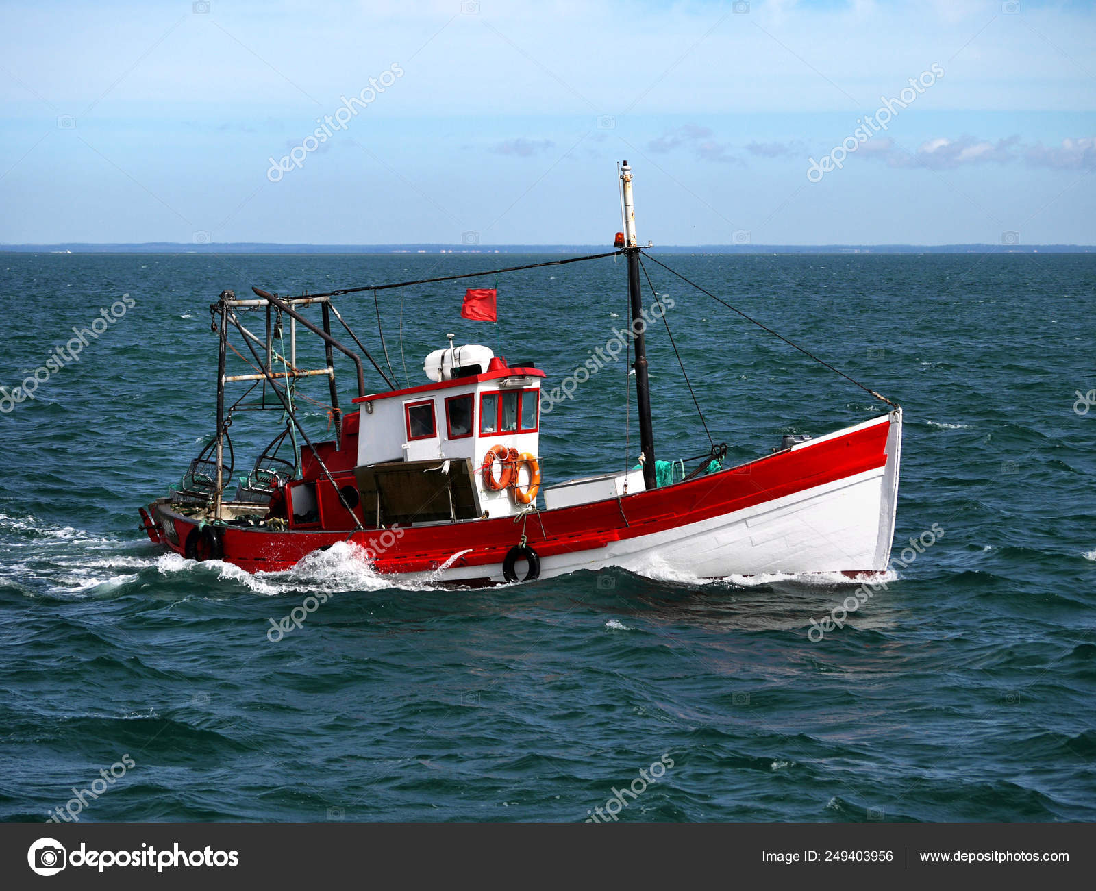 Small Portuguese Fishing Boat Underway Coast Stock Photo by ©daliscot  249403956