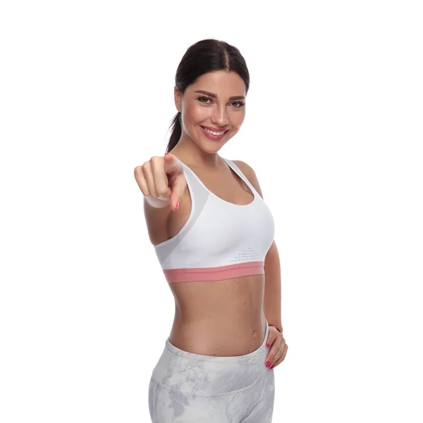 Portrait Happy Fitness Woman Pointing Finger While Standing White Background — Stock Photo, Image