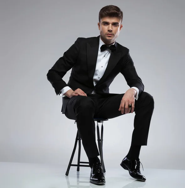 Sexy Confident Man Wearing Black Tuxedo Sitting Metal Chair Light — Stock Photo, Image