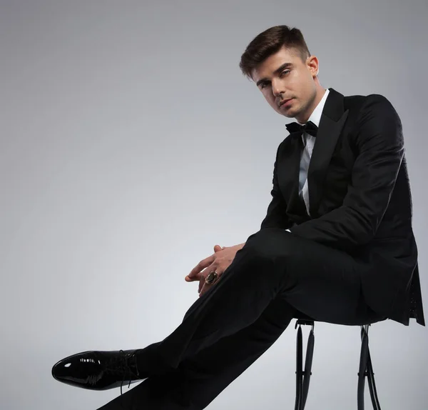 Side View Sexy Elegant Man Black Tuxedo Sitting Metal Chair — Stock Photo, Image